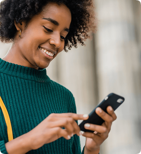 Woman using phone for rent payment